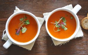 two bowls of tomato soup